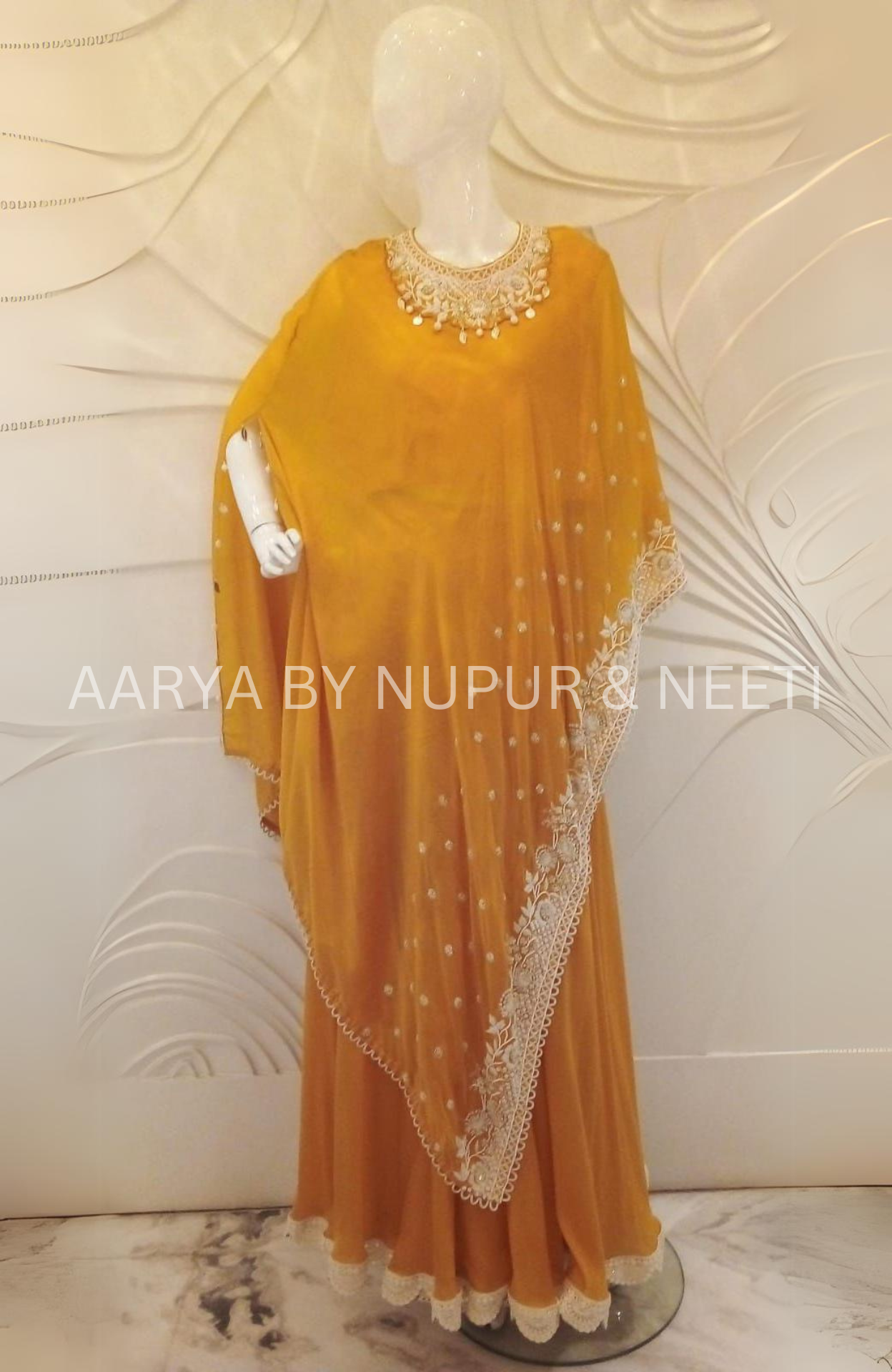 Pure Silk Bandhej Cape with Hand Embroidered Border and Neckline with Flair Palazzos