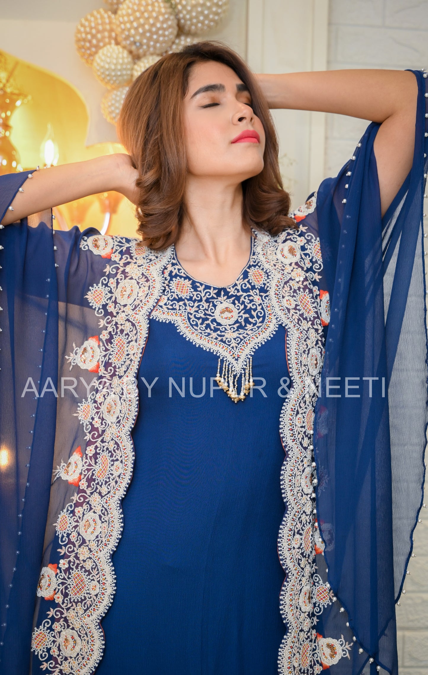 Chiffon Cape with Hand Embroidered Borders and Embroidered Kurta paired with Palazzos
