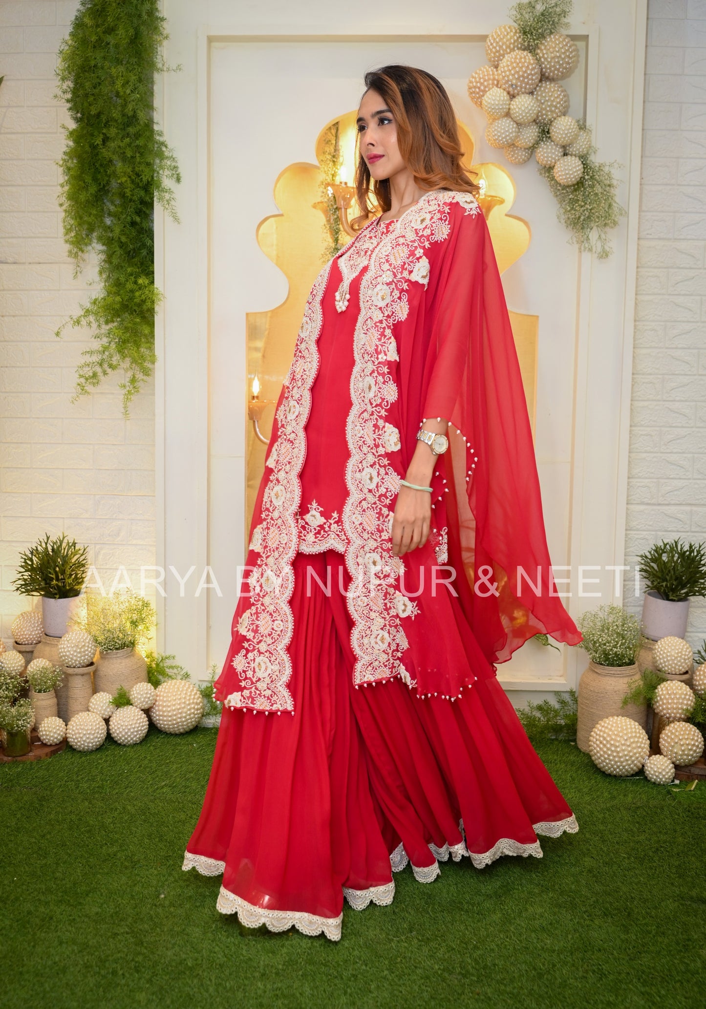 Chiffon Cape with Hand Embroidered Borders and Embroidered Kurta paired with Palazzos